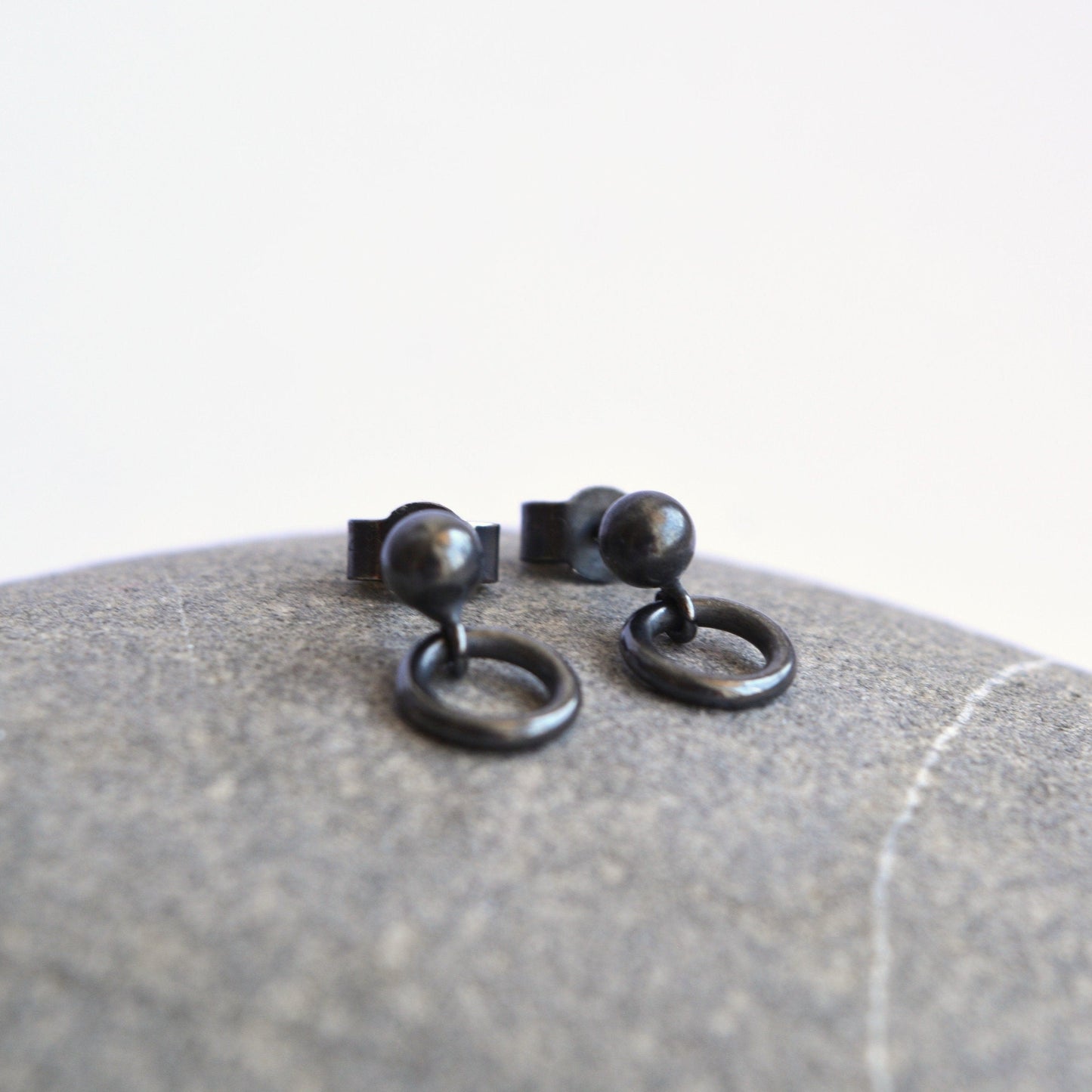 Oxidised sterling silver ball and circle stud earrings.
