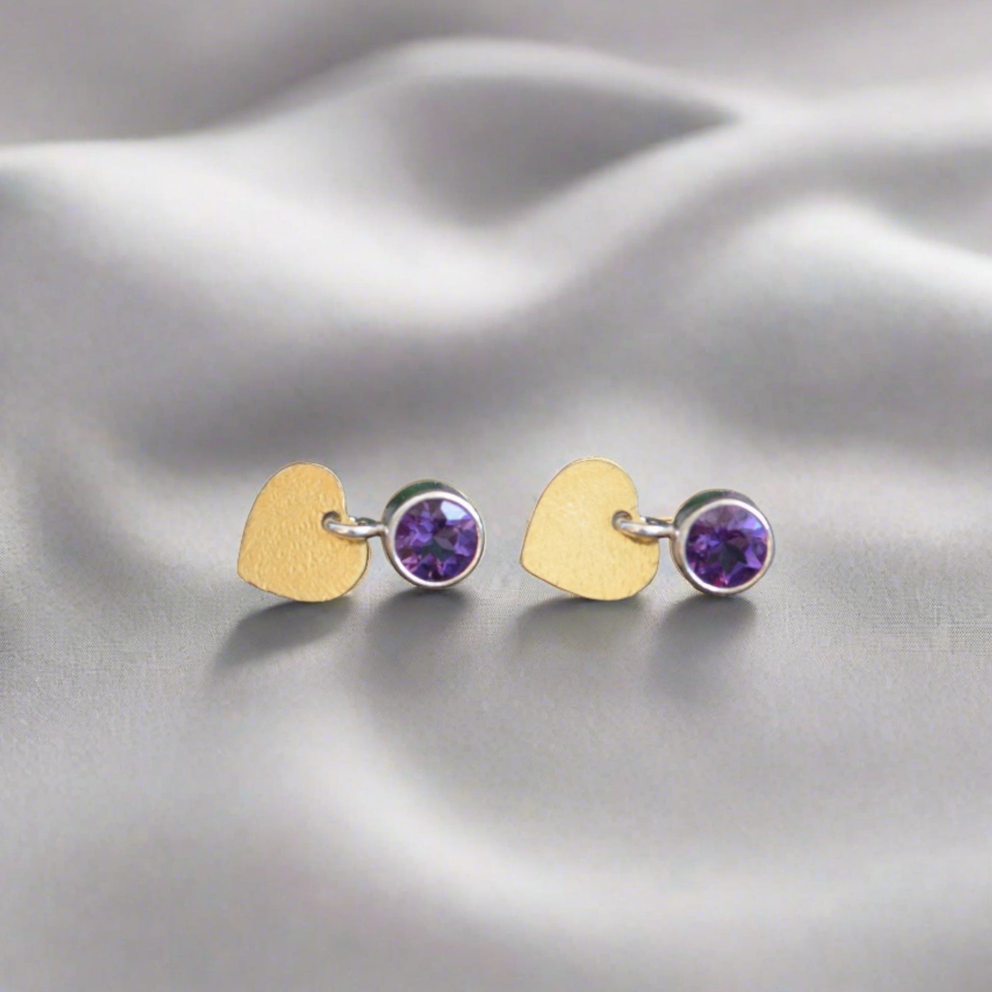 sterling silver amethyst stud earrings with gold plated hearts