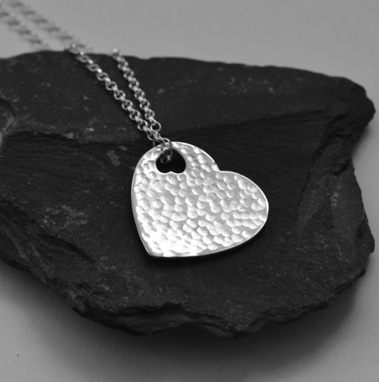 Hammered sterling silver heart necklace pendant.