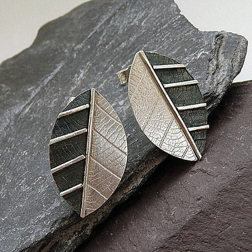 Sterling silver leaf stud earrings.