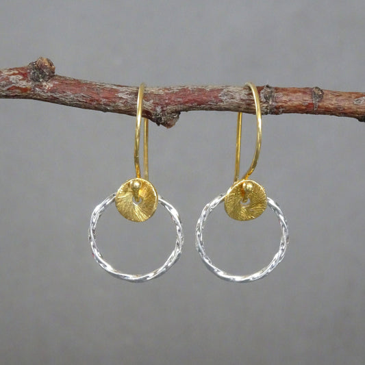 Circle dangle sterling silver earrings. Gold plated sterling silver ear wires and a small disc and sterling silver twisted circle