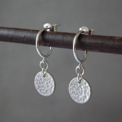 Sterling silver disc charm half hoop earrings.