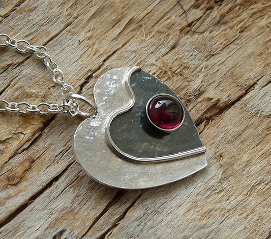 Garnet heart sterling silver necklace.