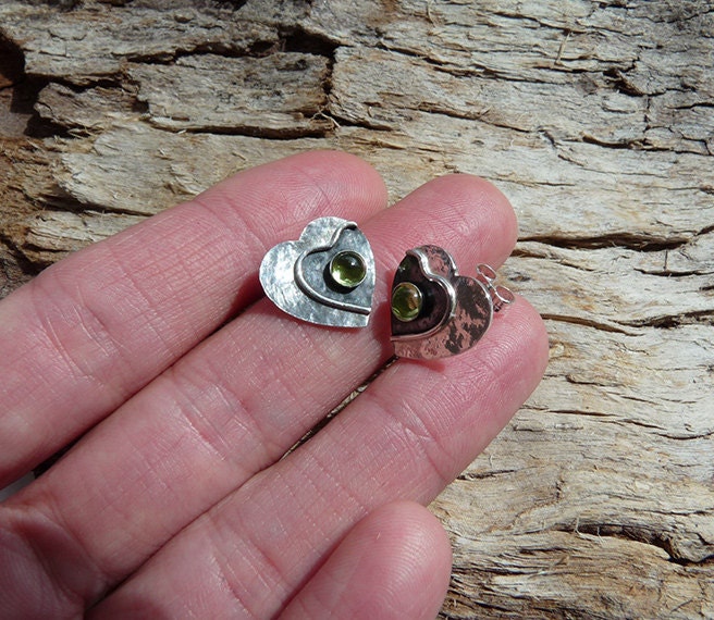 Peridot sterling silver heart stud earrings.