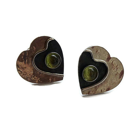 Peridot sterling silver heart stud earrings.
