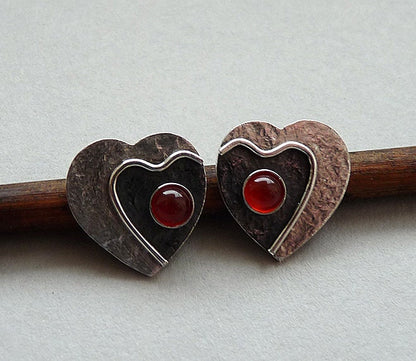 Carnelian sterling silver heart stud earrings.