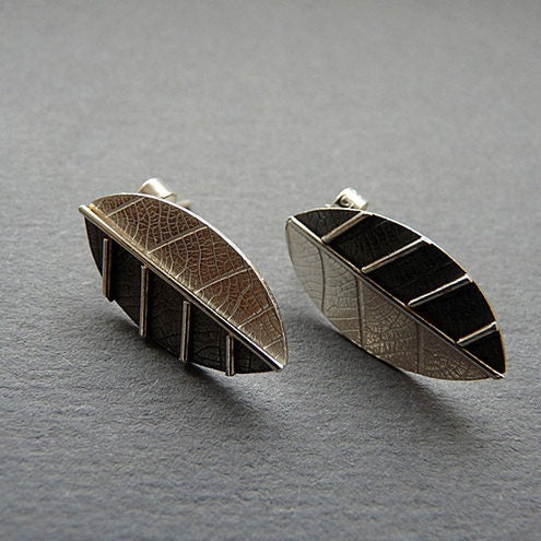 Sterling silver leaf stud earrings.