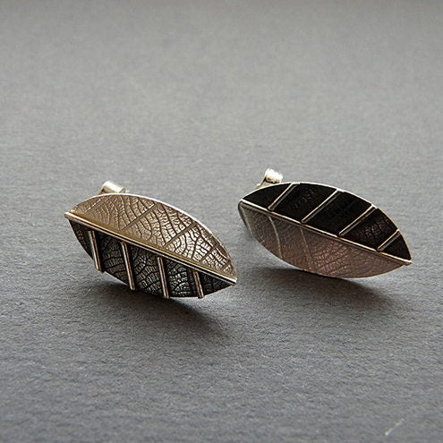 Sterling silver leaf stud earrings.