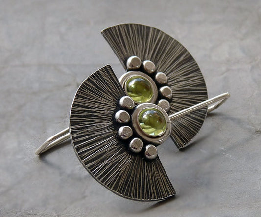 Peridot sterling silver fan earrings.