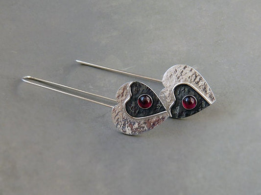 Garnet sterling silver heart earrings.