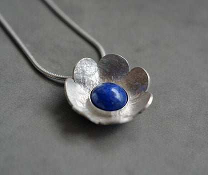 Artisan lapis lazuli flower sterling silver pendant necklace.