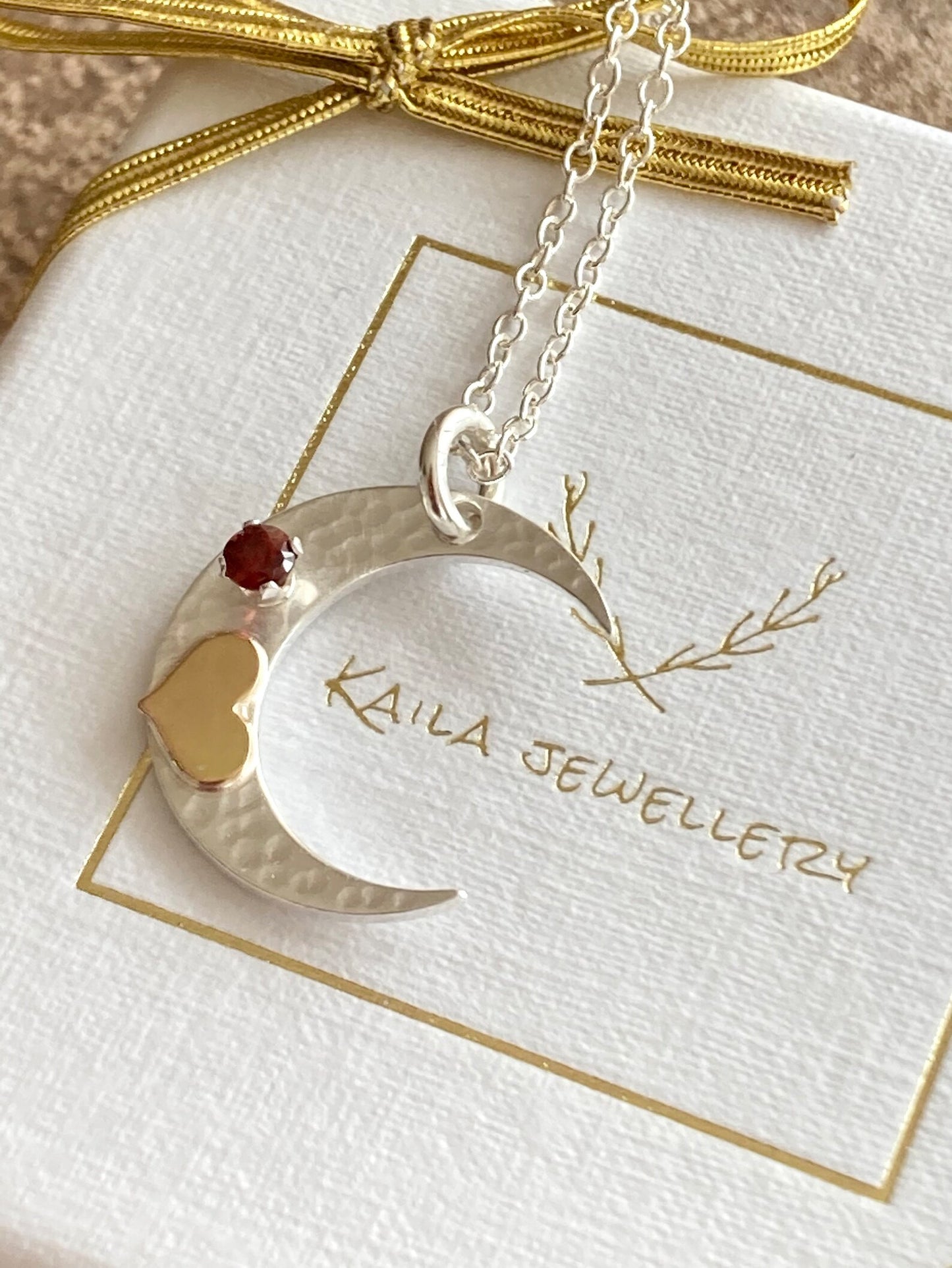 Sterling silver crescent moon, gold filled heart, garnet necklace.