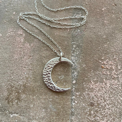 Crescent moon sterling silver necklace.
