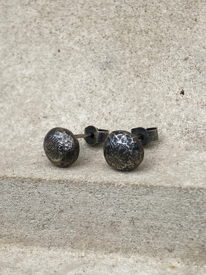 Oxidised sterling silver pebble stud earrings.